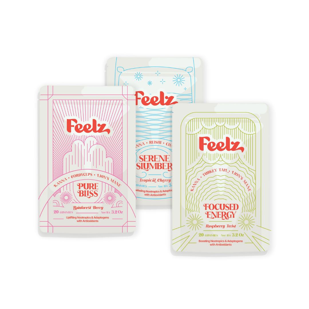 Feelz Pure Bliss, Serene Slumber, and Focused Energy gummies — three colorful wellness gummy packs with nootropics and adaptogens.